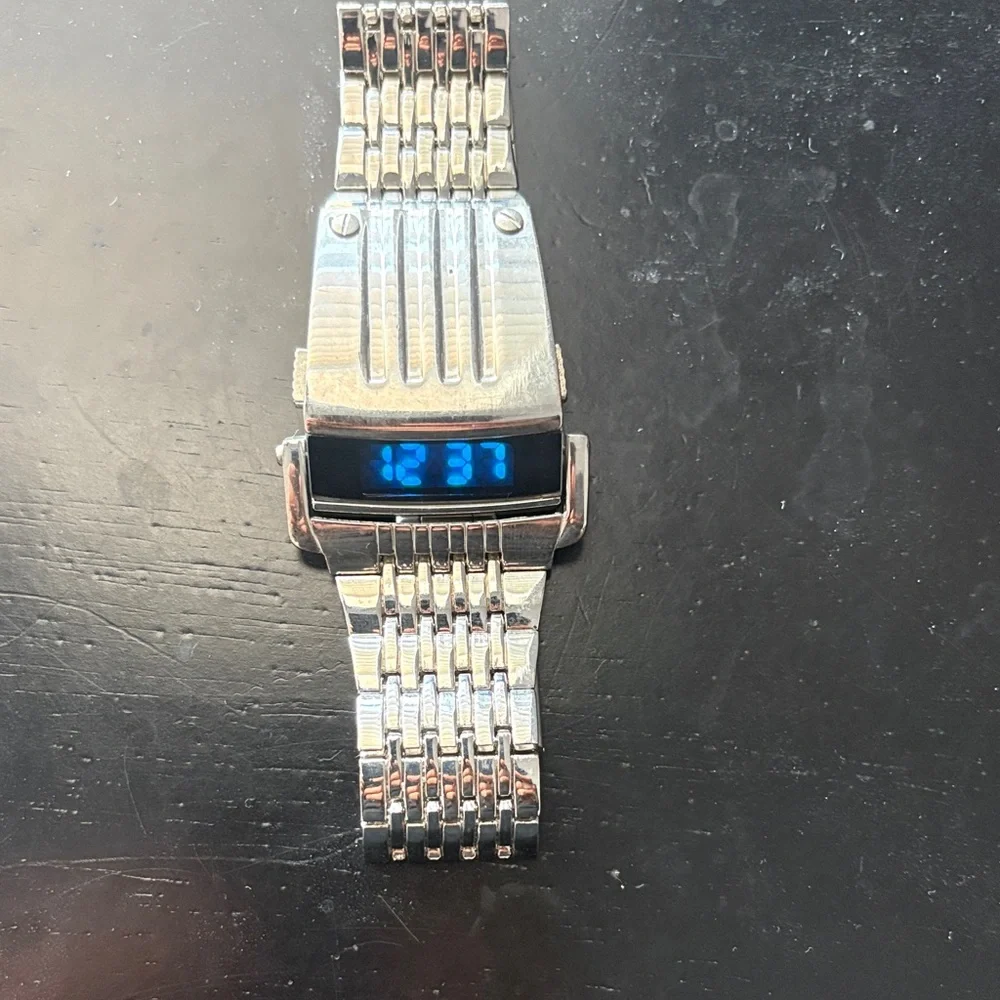 Elegant Silver Smartwatch with Blue Display